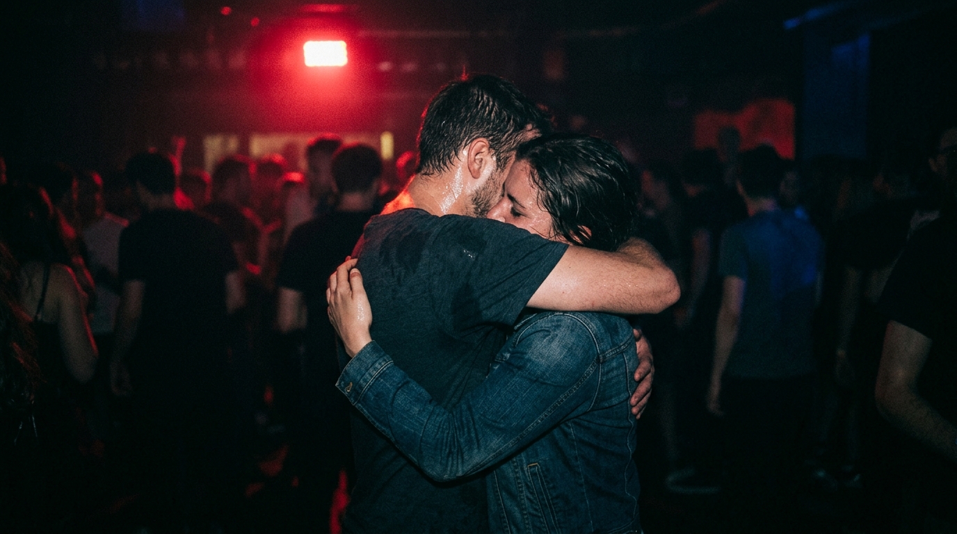 A Moody, Candid Shot Of A Couple Hugging Tightly On A...